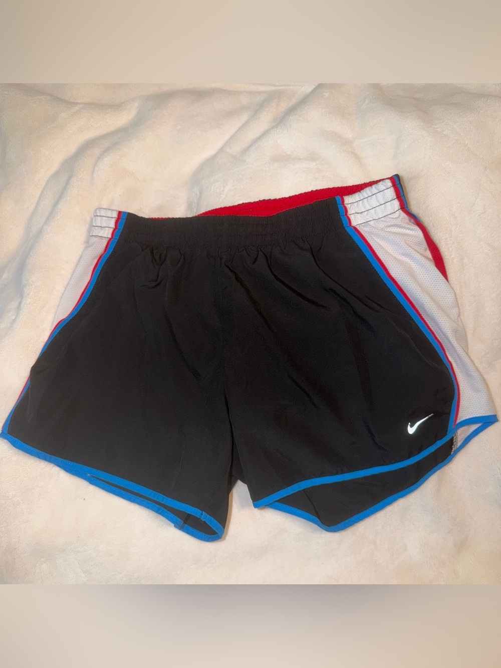 Nike Women's Black Athletic Shorts with Blue and Red Trim